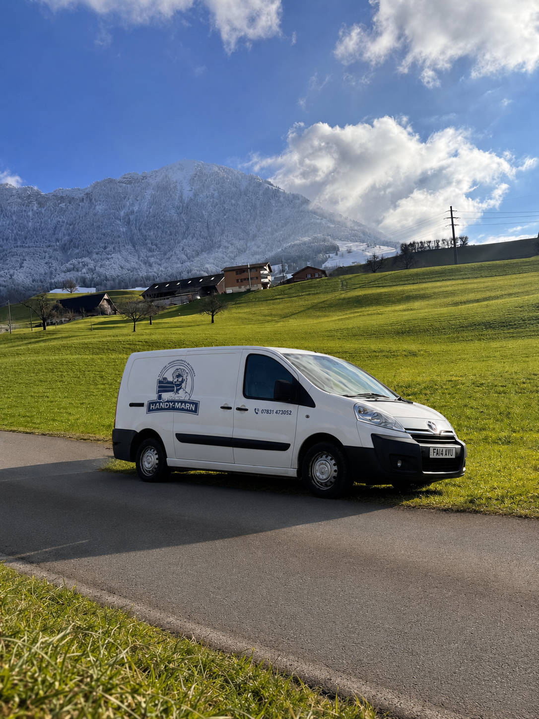 Handy-Marn branded van parked on a country road